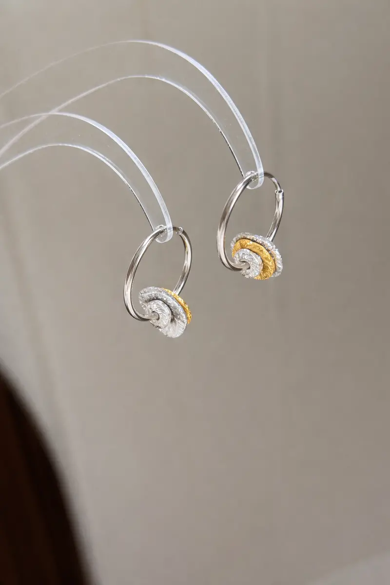 Ag Collective Jewelry – Infinite Twist Hoop Earrings (Two-Tone Gold & Silver) 1